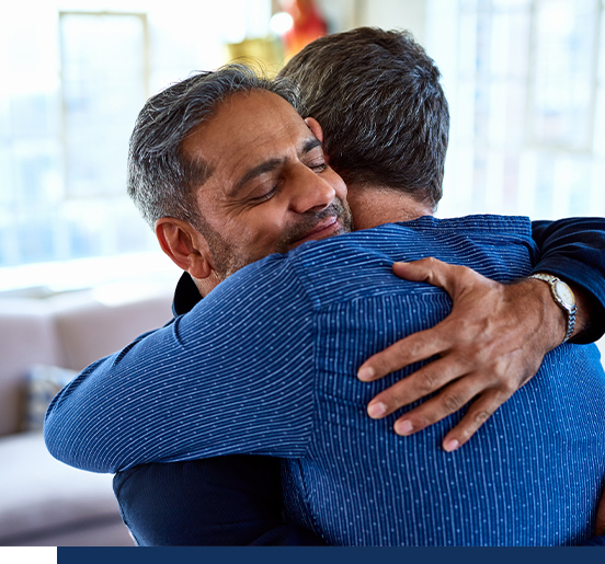 Two people hugging