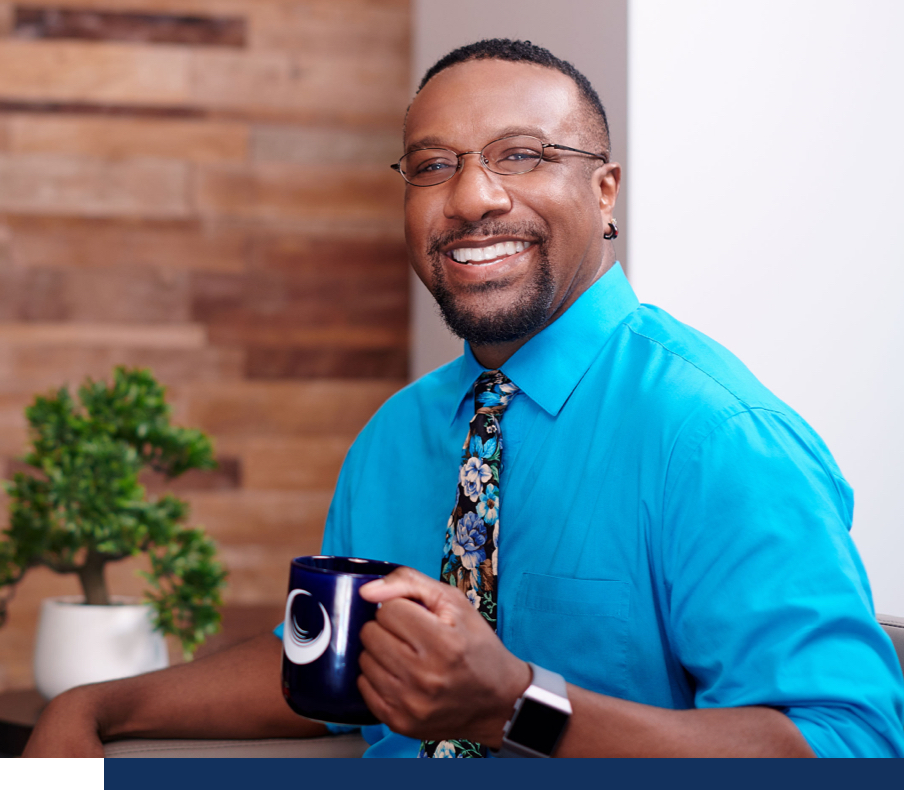 A Brandoma Laboratory employee smiling.