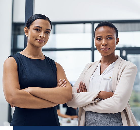 Two women standing.