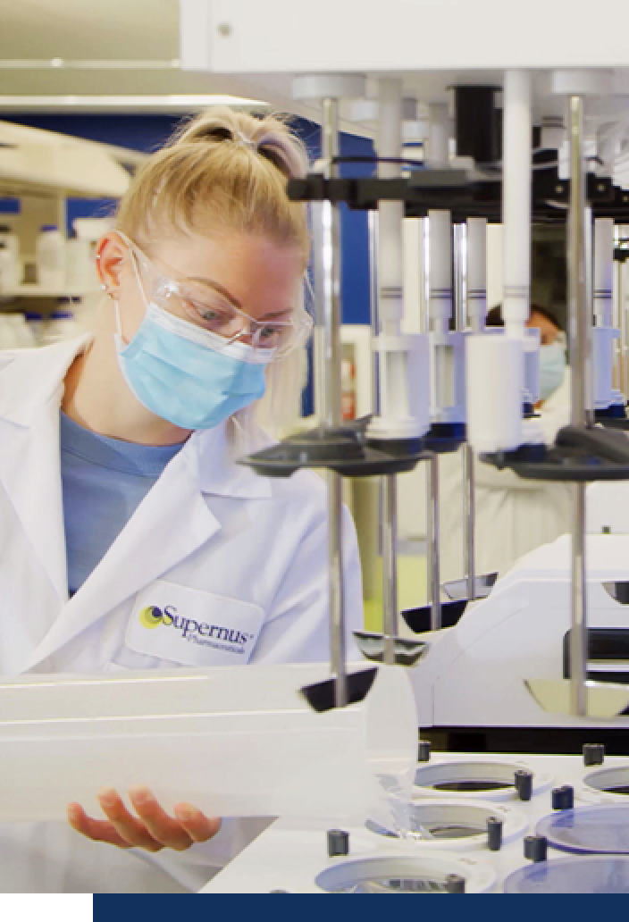 A woman scientist in a lab. 